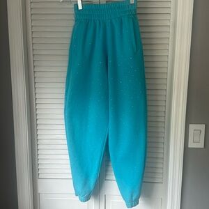 Blue sweatpants with rhinestones
